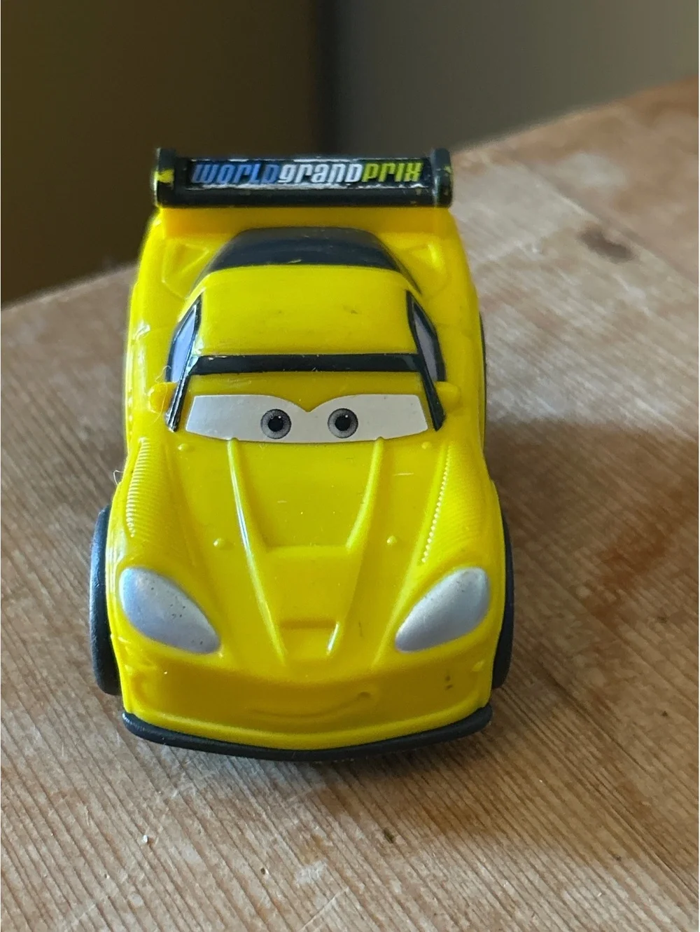 Fisher-Price Yellow World Grand Prix Toy Race Car